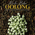 Mochi boba on a bed of oolong tea leaves with 'Mochi Boba Oolong' text from Pioka brand.